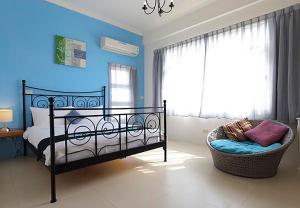 מיטה או מיטות בחדר ב-Summertimeph Homestay