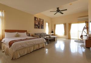 מיטה או מיטות בחדר ב-Summertimeph Homestay
