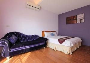 מיטה או מיטות בחדר ב-Summertimeph Homestay