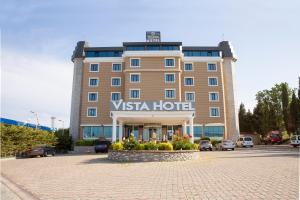a building with a sign that reads visa hotel at Premier Vista Hotel in Silivri
