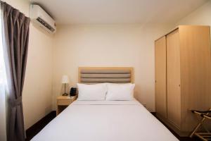Katil atau katil-katil dalam bilik di Royale Chulan Cherating Chalet