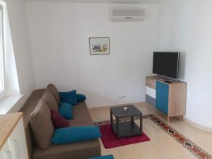TV a/nebo společenská místnost v ubytování D&M APARTMAN 1