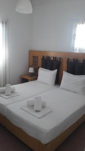 Cama ou camas em um quarto em Chaniotis Studios