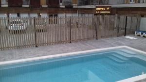 The swimming pool at or close to La Masia