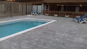 The swimming pool at or close to La Masia