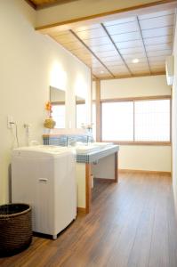 Kuchyň nebo kuchyňský kout v ubytování Guest House Takazuri-KITA