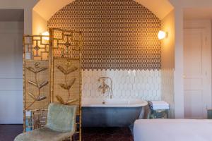 Postel nebo postele na pokoji v ubytování Le petit hotel