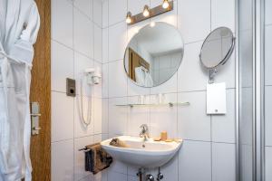 Koupelna v ubytování Hotel Das Schlossberg superior