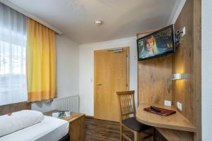 TV a/nebo společenská místnost v ubytování Hotel Das Schlossberg superior