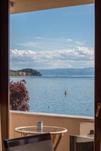 a view of a body of water from a window at Villa Darko - VIP Accomodations in Ohrid