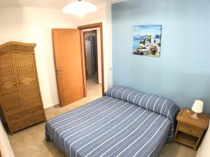 Tempat tidur dalam kamar di WHITE POOL Matino - Gallipoli - 7pl