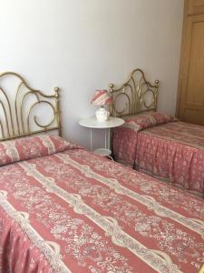 Postel nebo postele na pokoji v ubytování VUT sencilla y cómoda en Ávila capital.