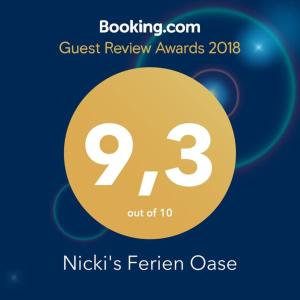 a sign that reads guest review awards nikicks feather case at Nicki's Ferien Oase in Bornhöved