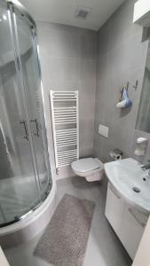 Kúpeľňa v ubytovaní Small Apartments Denisa Business