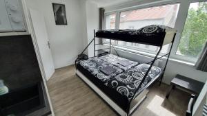 Posteľ alebo postele v izbe v ubytovaní Small Apartments Denisa Business