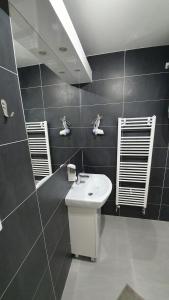 Kúpeľňa v ubytovaní Small Apartments Denisa Business