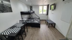 Posteľ alebo postele v izbe v ubytovaní Small Apartments Denisa Business