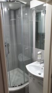 Kúpeľňa v ubytovaní Small Apartments Denisa Business