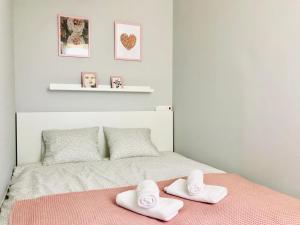 Posteľ alebo postele v izbe v ubytovaní Apartament Poznańska24