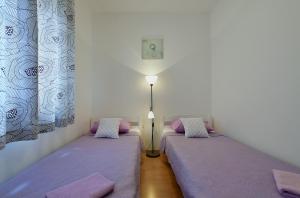 Postel nebo postele na pokoji v ubytování House Vedran 1125 + 37 fotografií
