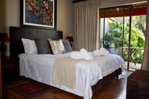 Green Pascua Bed and Breakfast客房内的一张或多张床位