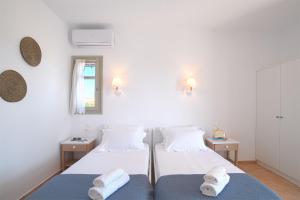 Posteľ alebo postele v izbe v ubytovaní Golden Sand Paros