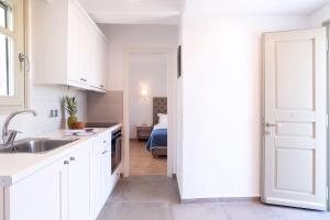 Kuchyňa alebo kuchynka v ubytovaní Golden Sand Paros