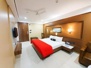 Postel nebo postele na pokoji v ubytování Enrise by Sayaji ,Pune