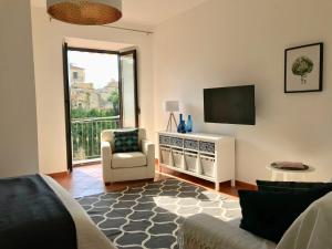 A television and/or entertainment centre at Studio Sant'Antonio