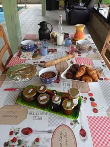 a table with various food items on it at Chez Marie Ange et Clovis in Rumilly-lès-Vaudes +1 photo