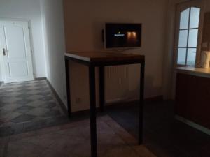 A television and/or entertainment center at apartmany Jan Becher