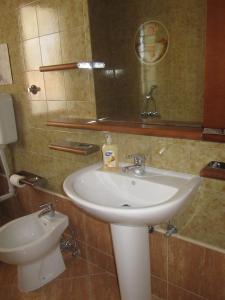 Koupelna v ubytování Apartments Mari