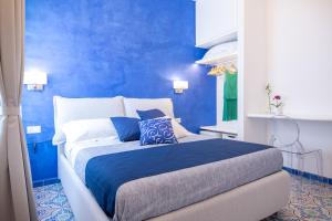 Krevet ili kreveti u jedinici u okviru objekta Valle d'Amalfi Suites