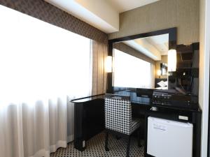 Majoituspaikan APA Hotel Shinjuku Kabukicho Chuo keittiö tai keittotila