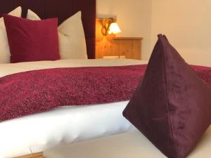 Postel nebo postele na pokoji v ubytování Hotel Garni Landhaus Florian