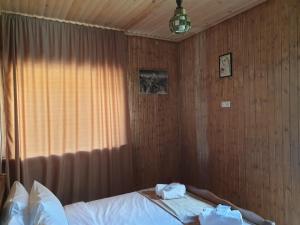 Ένα ή περισσότερα κρεβάτια σε δωμάτιο στο Bana
