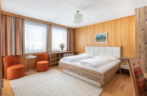 Łóżko lub łóżka w pokoju w obiekcie Gästehaus Frischhut