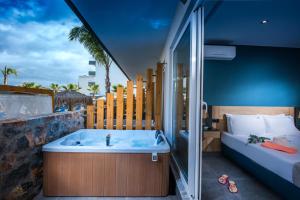 Posteľ alebo postele v izbe v ubytovaní Infinity Blue Boutique Hotel & Spa - Adults Only