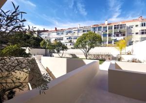 a view from the balcony of a building at Casa René - Charming apartments in Almada
