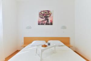 Postel nebo postele na pokoji v ubytování Apartments Summer Dream