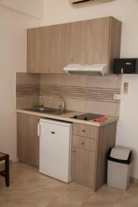 A kitchen or kitchenette at Studios Stavris