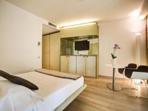 Кровать или кровати в номере Hotel Premier & Suites - Premier Resort