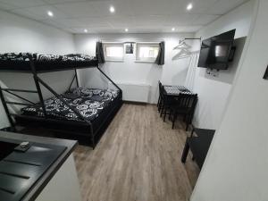 Posteľ alebo postele v izbe v ubytovaní Small Apartments Denisa Business