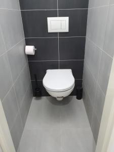 Kúpeľňa v ubytovaní Small Apartments Denisa Business
