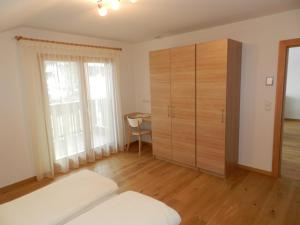 Posteľ alebo postele v izbe v ubytovaní Apartments Bachmann