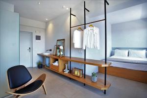 Posteľ alebo postele v izbe v ubytovaní Basilico Suites Adults Only by Estia