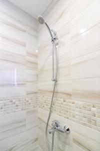 Domus Apartments Grand tesisinde bir banyo