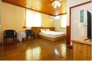 Giường trong phòng chung tại The Country B&B