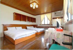 Giường trong phòng chung tại The Country B&B