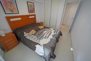 Postel nebo postele na pokoji v ubytování Apartamento Corazón de Monte Carlo